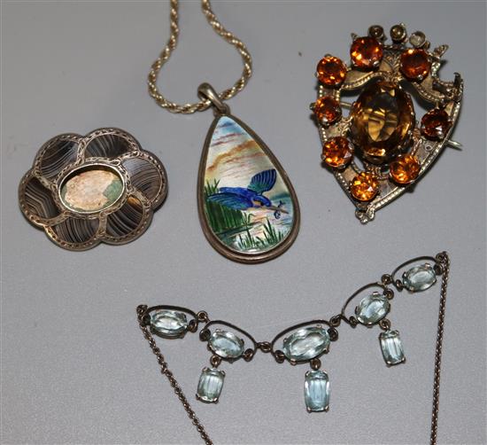 Bag of silver items including enamelled bird pendant and Scottish brooches
